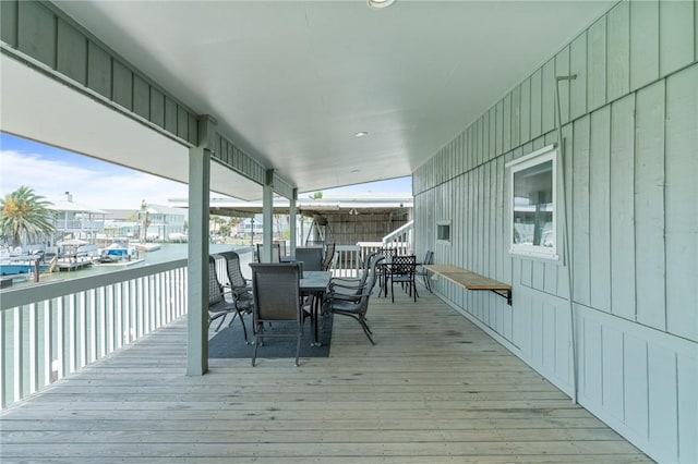 deck with outdoor dining space