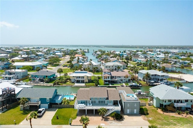 aerial view with a water view and a residential view