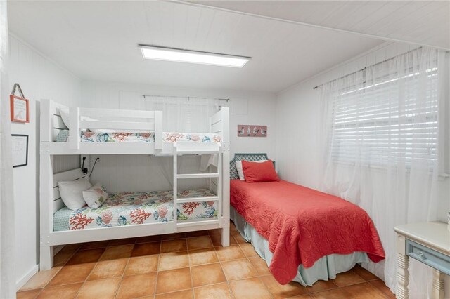 bedroom with tile patterned floors