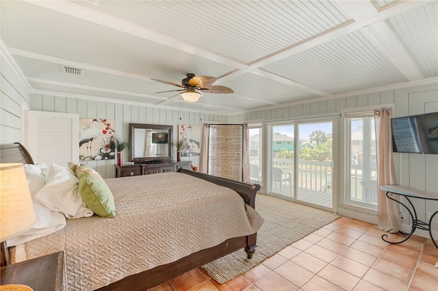 tiled bedroom featuring visible vents, access to exterior, a ceiling fan, and beam ceiling