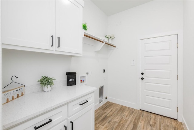 2513 Luzius Dr, Corpus Christi, TX 78418 - washroom with cabinet space, electric dryer hookup, light wood-style flooring, washer hookup, and baseboards