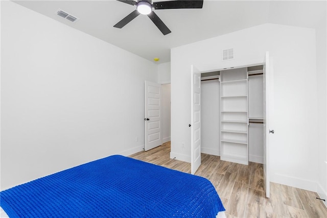 2513 Luzius Dr, Corpus Christi, TX 78418 - unfurnished bedroom featuring wood finished floors, a closet, and baseboards