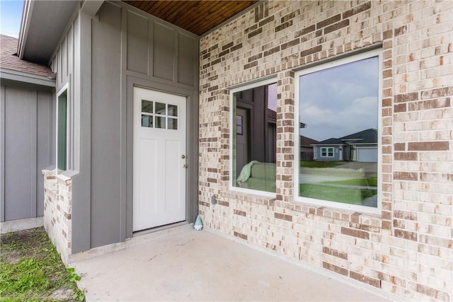 2513 Luzius Dr, Corpus Christi, TX 78418 - property entrance featuring board and batten siding