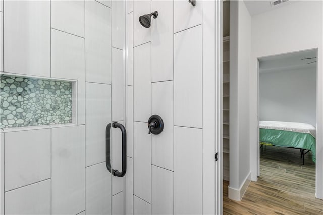 2513 Luzius Dr, Corpus Christi, TX 78418 - bathroom view of tiled shower and wood finished floors