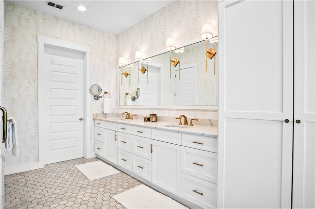 bathroom with vanity and tile patterned floors