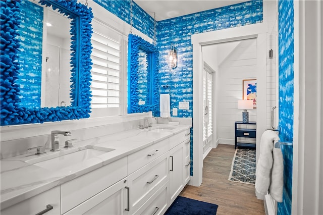 bathroom featuring wood-type flooring and vanity