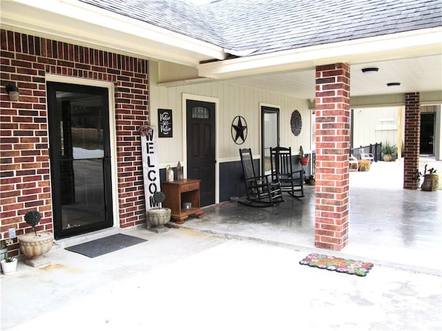 entrance to property with a porch