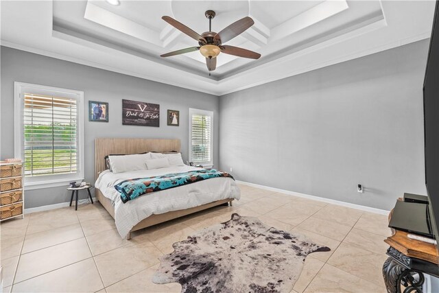 221 Deer Meadows Dr, Alice, TX 78332 - bedroom with a tray ceiling, multiple windows, ceiling fan, baseboards, and crown molding