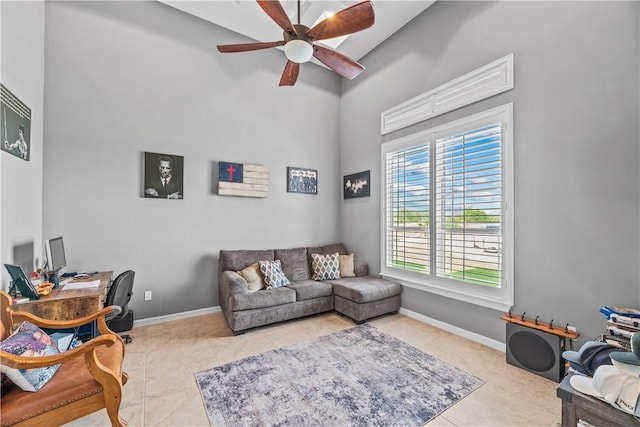221 Deer Meadows Dr, Alice, TX 78332 - living room with a ceiling fan, high vaulted ceiling, tile patterned floors, and baseboards