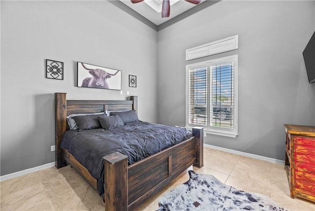 221 Deer Meadows Dr, Alice, TX 78332 - bedroom with baseboards, light tile patterned flooring, and a ceiling fan