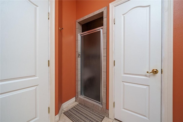 bathroom featuring walk in shower