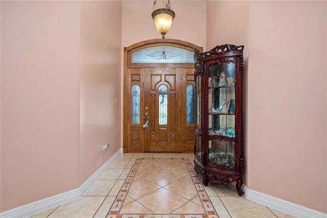 foyer with light tile patterned floors