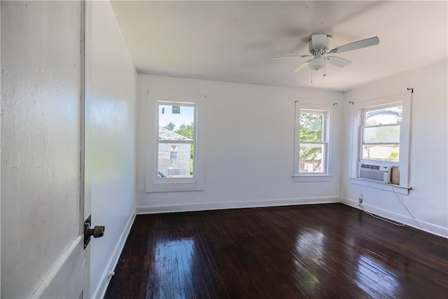 unfurnished room featuring ceiling fan, cooling unit, and dark hardwood / wood-style flooring