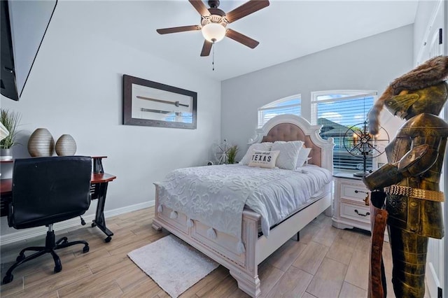 bedroom with ceiling fan and light wood-type flooring