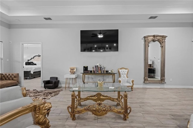 living room featuring ornamental molding and hardwood / wood-style floors