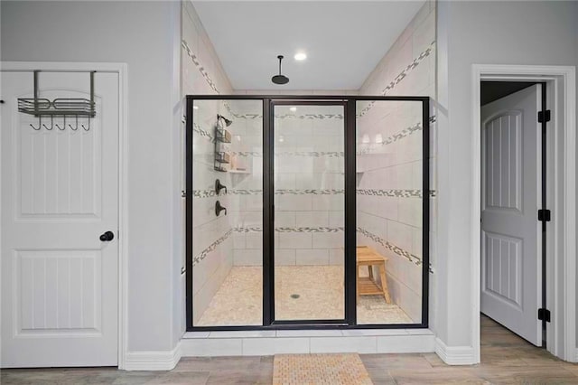 entryway with hardwood / wood-style floors