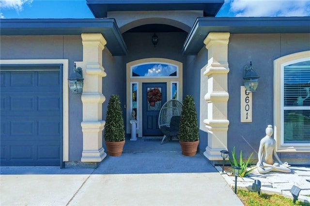 property entrance with a garage