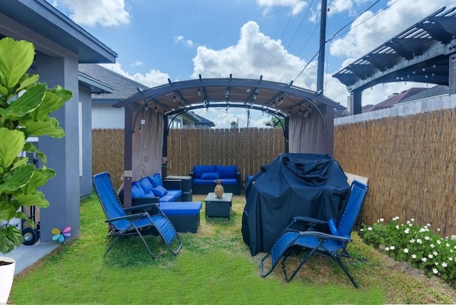 view of patio featuring outdoor lounge area, a grill, and a gazebo