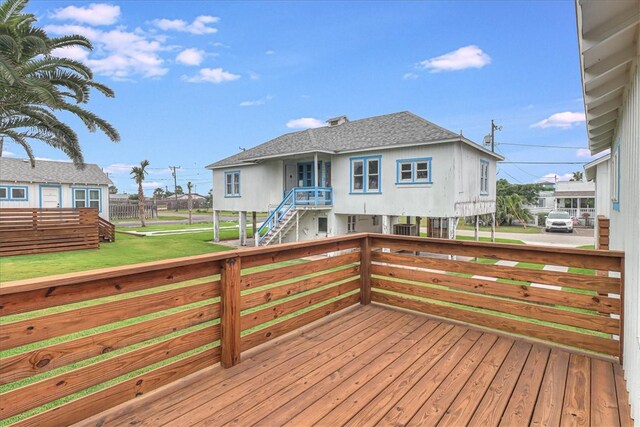 deck featuring a yard