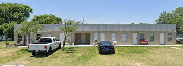 view of front of house with a front yard