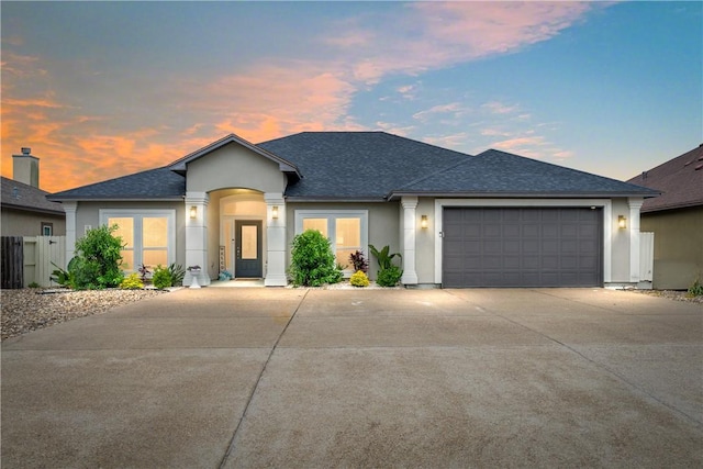 15433 Finistere St, Corpus Christi, TX 78418 - single story home featuring a shingled roof, concrete driveway, a garage, and stucco siding