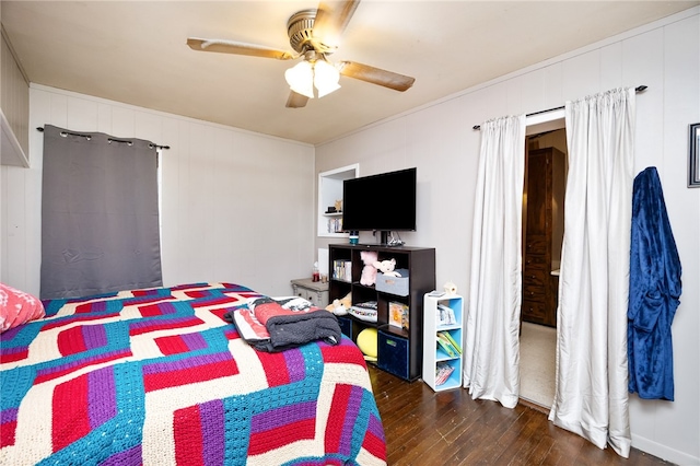 bedroom featuring ceiling fan and dark hardwood / wood-style flooring