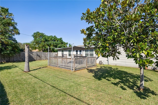 view of yard featuring a deck