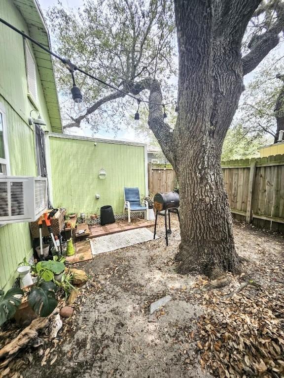 402 E Nopal St, Rockport, TX 78382 - view of yard with fence and cooling unit