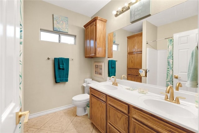 13706 Sea Horse Ave, Corpus Christi, TX 78418 - full bathroom with double vanity, tile patterned flooring, and curtained shower