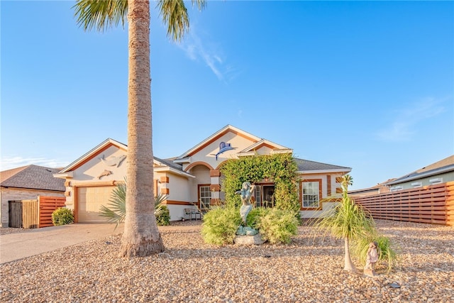 view of front of property featuring a garage