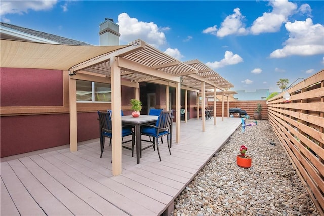 13706 Sea Horse Ave, Corpus Christi, TX 78418 - wooden terrace with a pergola, a fenced backyard, and outdoor dining area