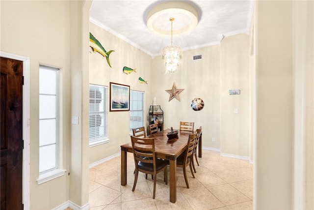 13706 Sea Horse Ave, Corpus Christi, TX 78418 - dining area with a chandelier, light tile patterned floors, crown molding, and arched walkways