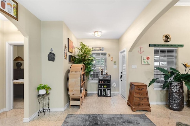 13706 Sea Horse Ave, Corpus Christi, TX 78418 - foyer with arched walkways and light tile patterned floors