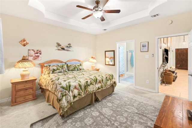13706 Sea Horse Ave, Corpus Christi, TX 78418 - carpeted bedroom featuring a raised ceiling, a ceiling fan, and ensuite bath