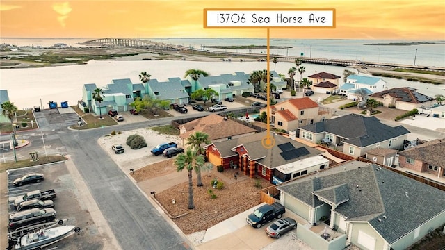 13706 Sea Horse Ave, Corpus Christi, TX 78418 - aerial view at dusk of a water view and a residential view