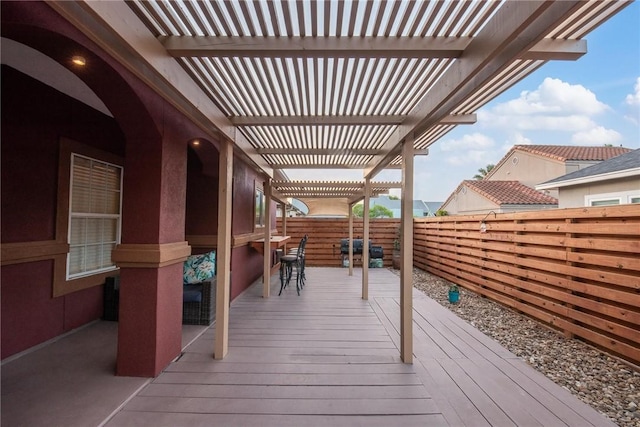 13706 Sea Horse Ave, Corpus Christi, TX 78418 - wooden deck with a fenced backyard, a pergola, and a grill