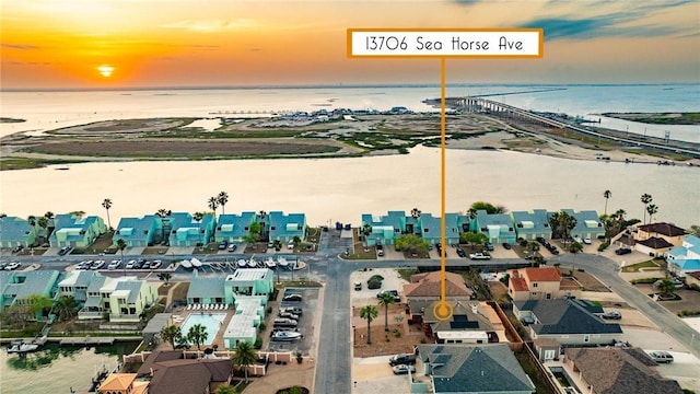 13706 Sea Horse Ave, Corpus Christi, TX 78418 - aerial view at dusk of a water view and a residential view
