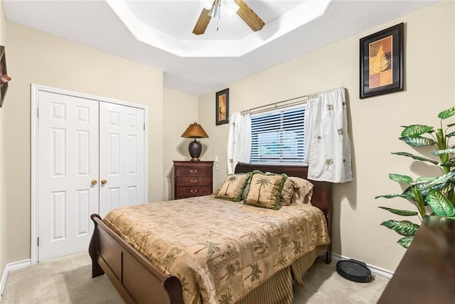 13706 Sea Horse Ave, Corpus Christi, TX 78418 - bedroom with carpet floors, a raised ceiling, a closet, and ceiling fan