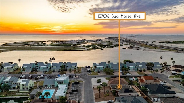 13706 Sea Horse Ave, Corpus Christi, TX 78418 - aerial view of residential area with a large body of water