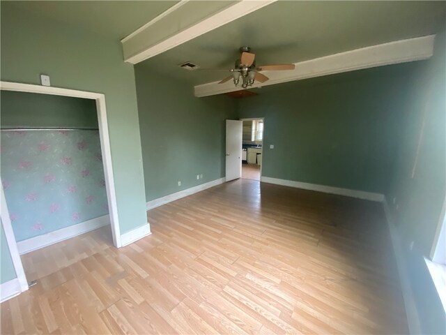 interior space featuring light hardwood / wood-style floors and ceiling fan