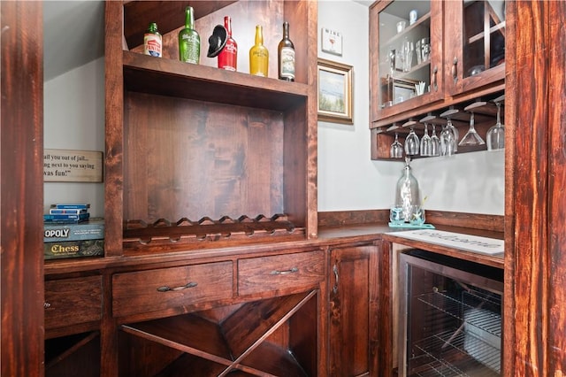 502 Sailhouse Way, Rockport, TX 78382 - interior space featuring vaulted ceiling, a dry bar, and wine cooler