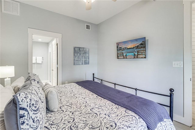 bedroom featuring ceiling fan, ensuite bath, and visible vents