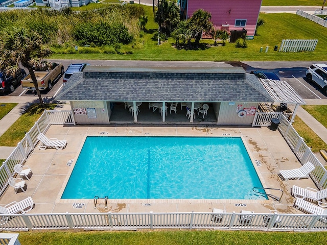 view of swimming pool featuring a patio area