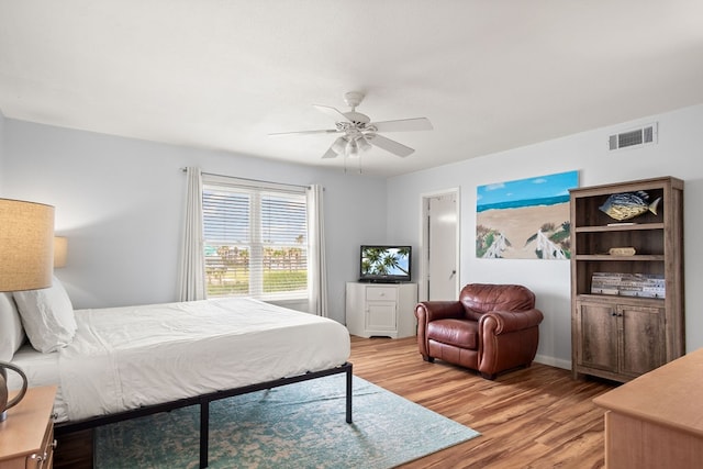 bedroom featuring ceiling fan and light wood-type flooring