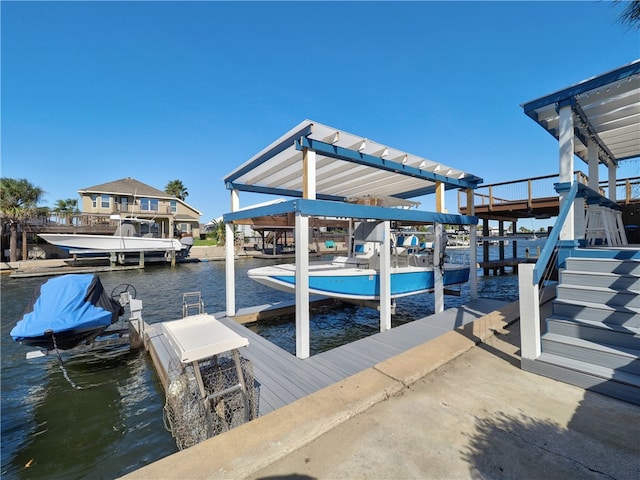 dock area featuring a water view