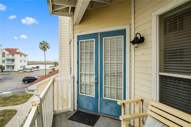 view of exterior entry featuring french doors