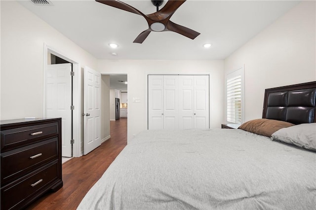 606 Grant Pl, Corpus Christi, TX 78411 - bedroom with dark wood finished floors, a closet, a ceiling fan, and recessed lighting