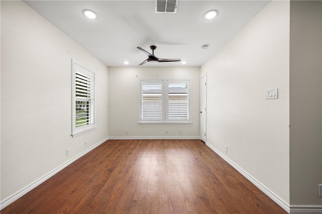 606 Grant Pl, Corpus Christi, TX 78411 - spare room with wood finished floors, healthy amount of natural light, ceiling fan, recessed lighting, and a smoke detector