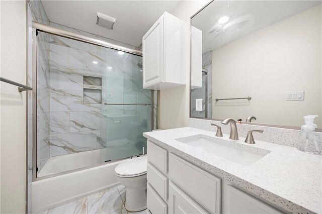 606 Grant Pl, Corpus Christi, TX 78411 - full bath featuring vanity, shower / bath combination with glass door, and marble look tile flooring