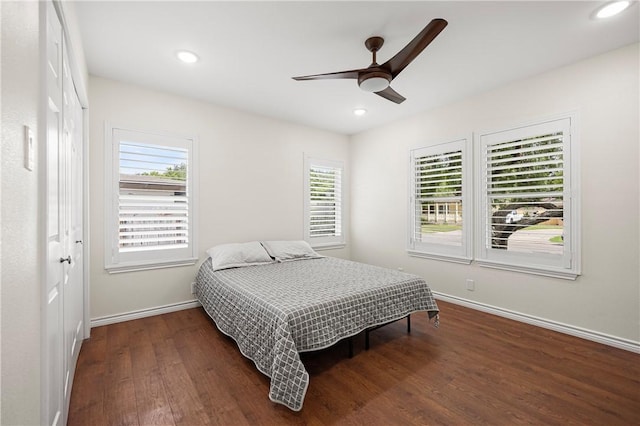 606 Grant Pl, Corpus Christi, TX 78411 - bedroom with multiple windows, wood finished floors, a closet, recessed lighting, and ceiling fan